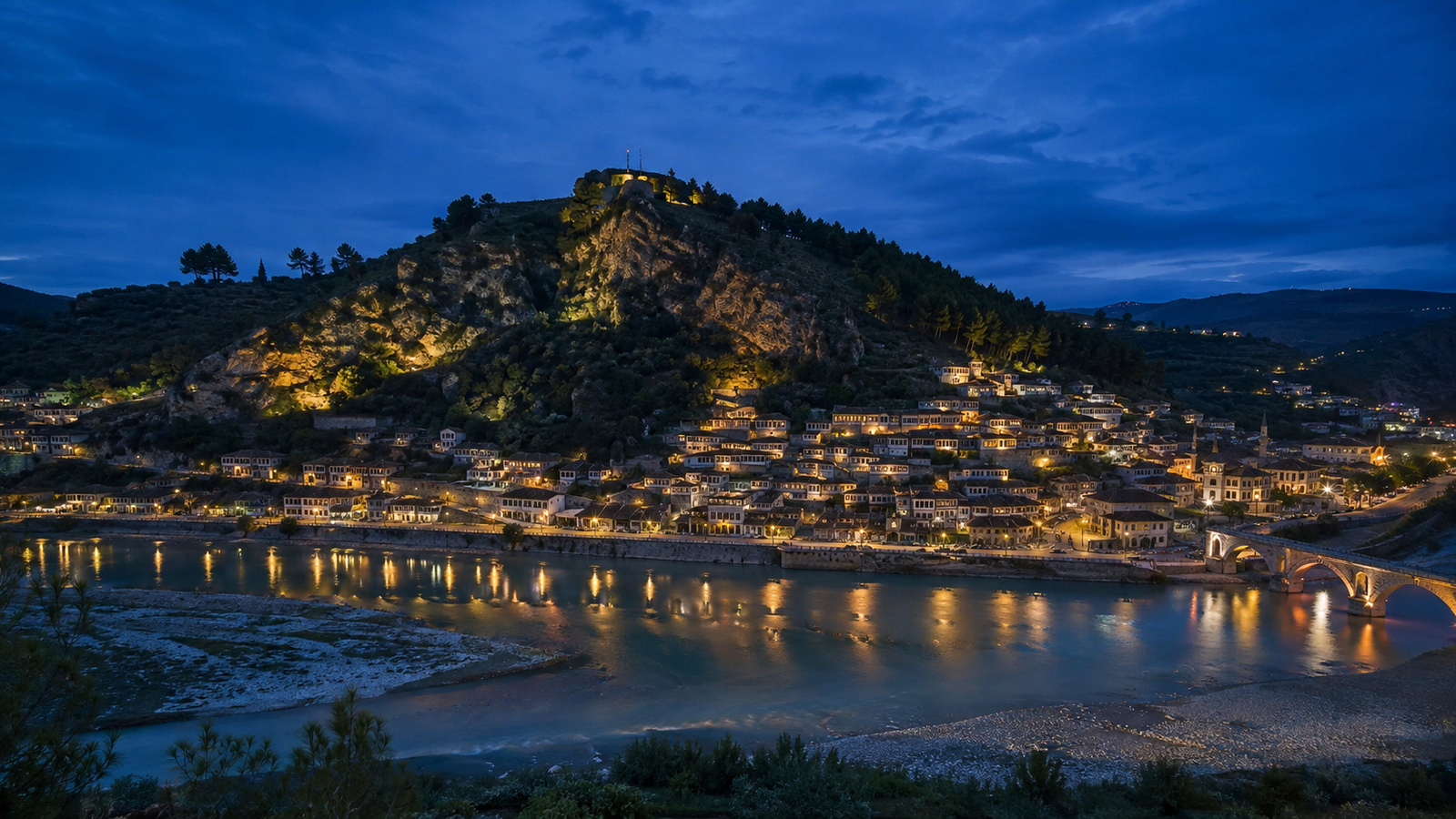 Blue hour panorama of Gjirokastër Castle and the historic stone city