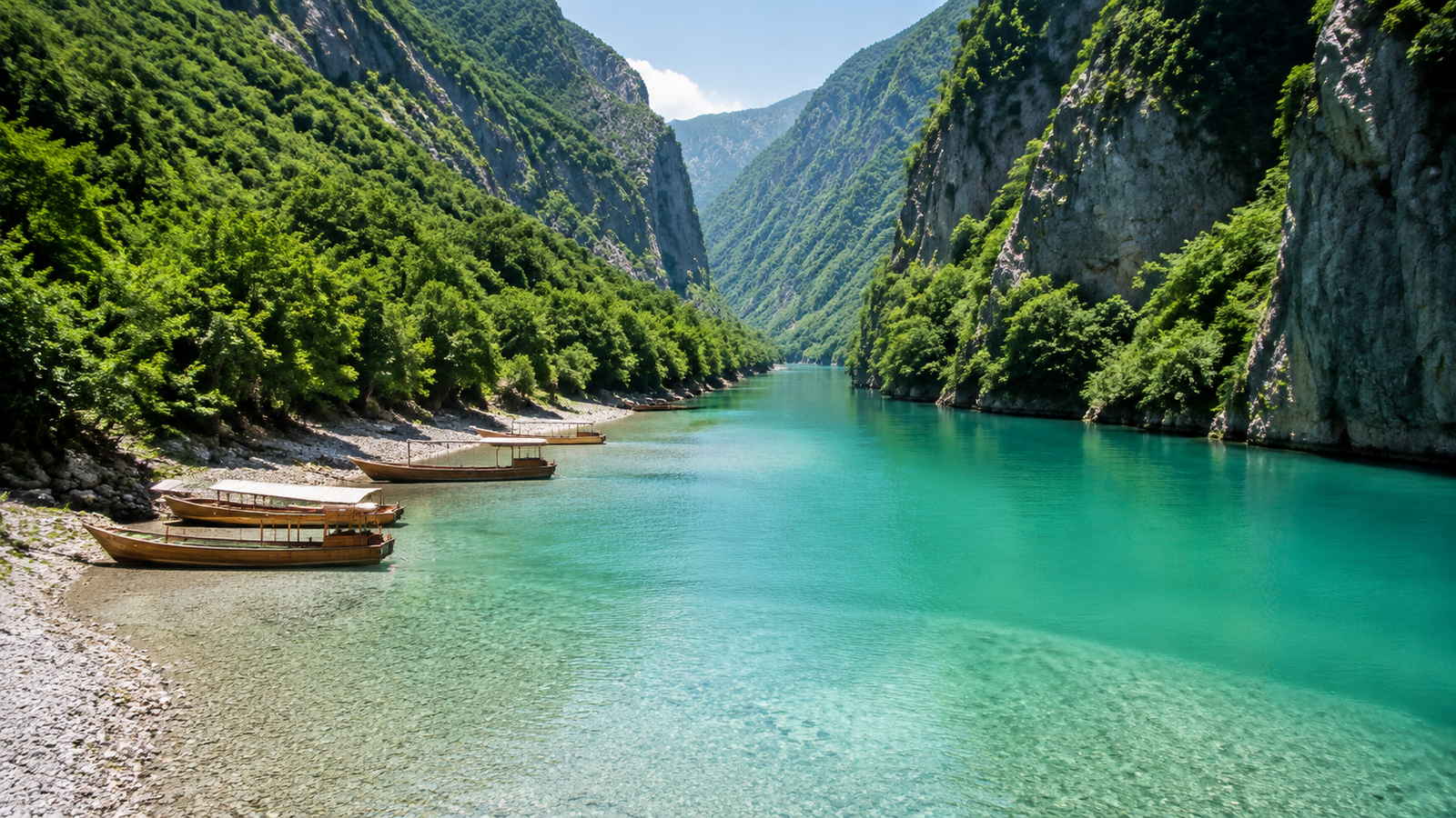 Passenger and vehicle ferry travelling across Lake Koman toward Fierzë