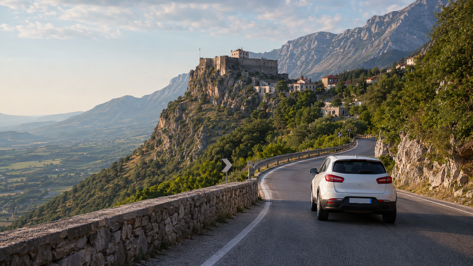 Rental car travelling toward Krujë Castle and Mount Krujë