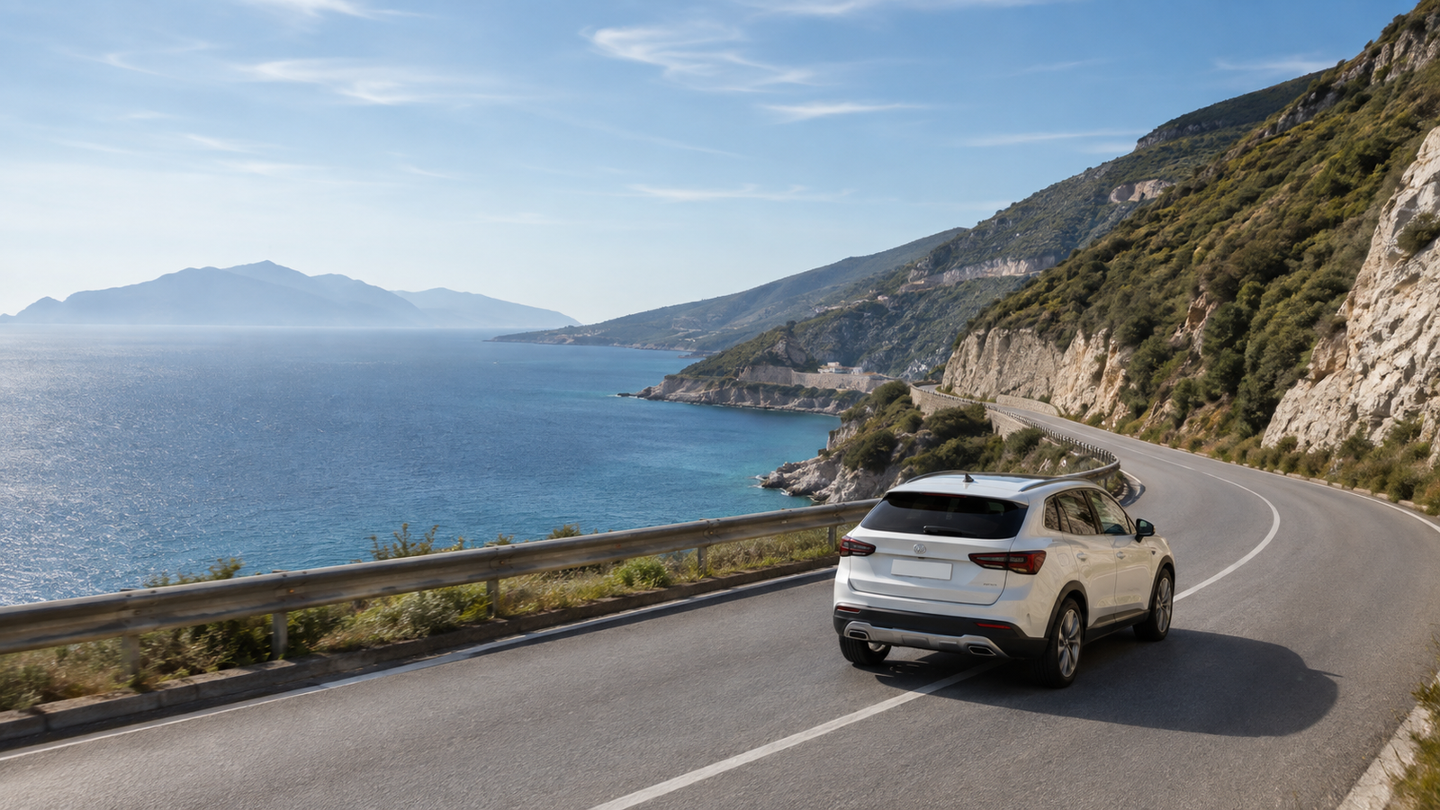Rental car travelling along the panoramic road of the Albanian Riviera