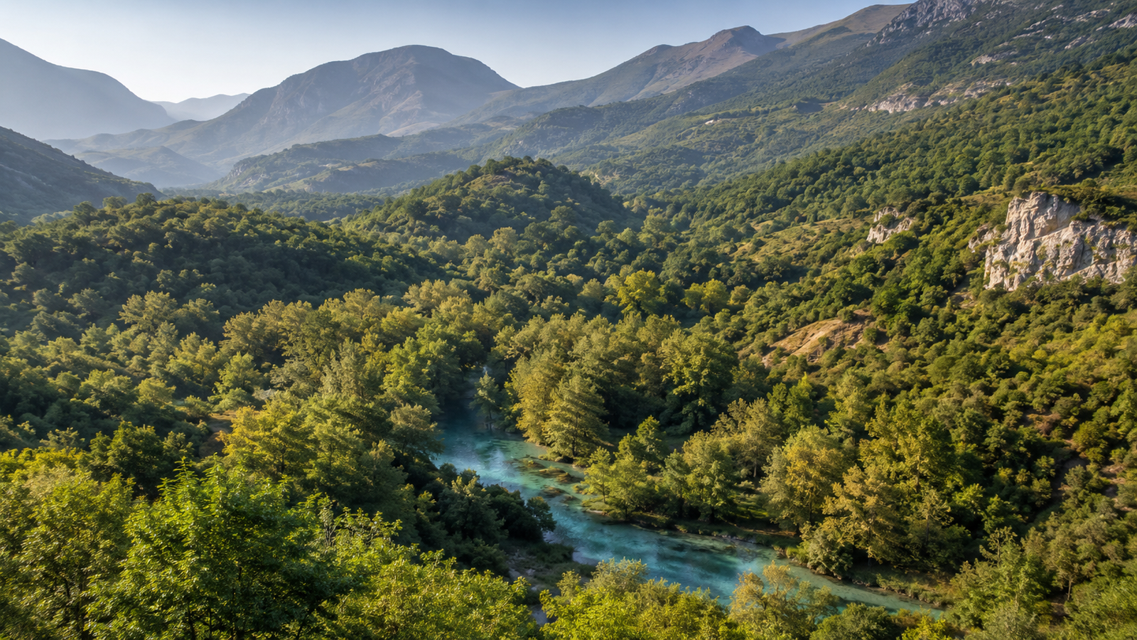 Wide panorama of the Blue Eye valley and its forested southern Albanian landscape
